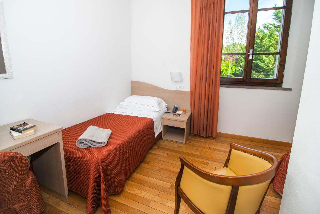 Hotel La Colonna Siena Bagian luar foto