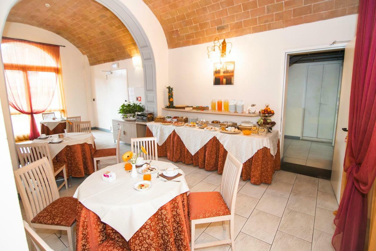 Hotel La Colonna Siena Bagian luar foto